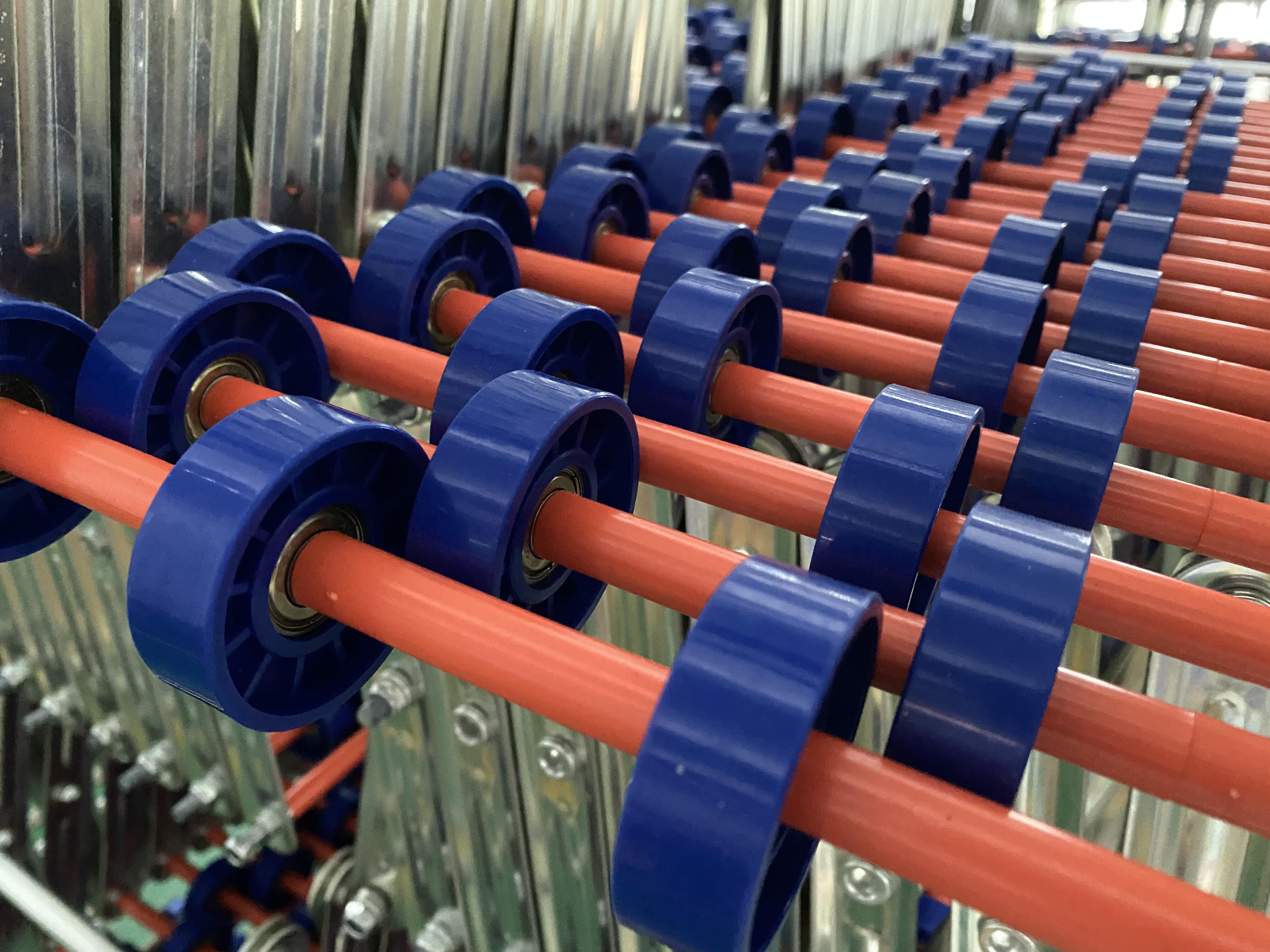 Gravity Skate Wheel Conveyor Unloading: ABS Plastic Wheels vs. Galvanized Steel Wheels