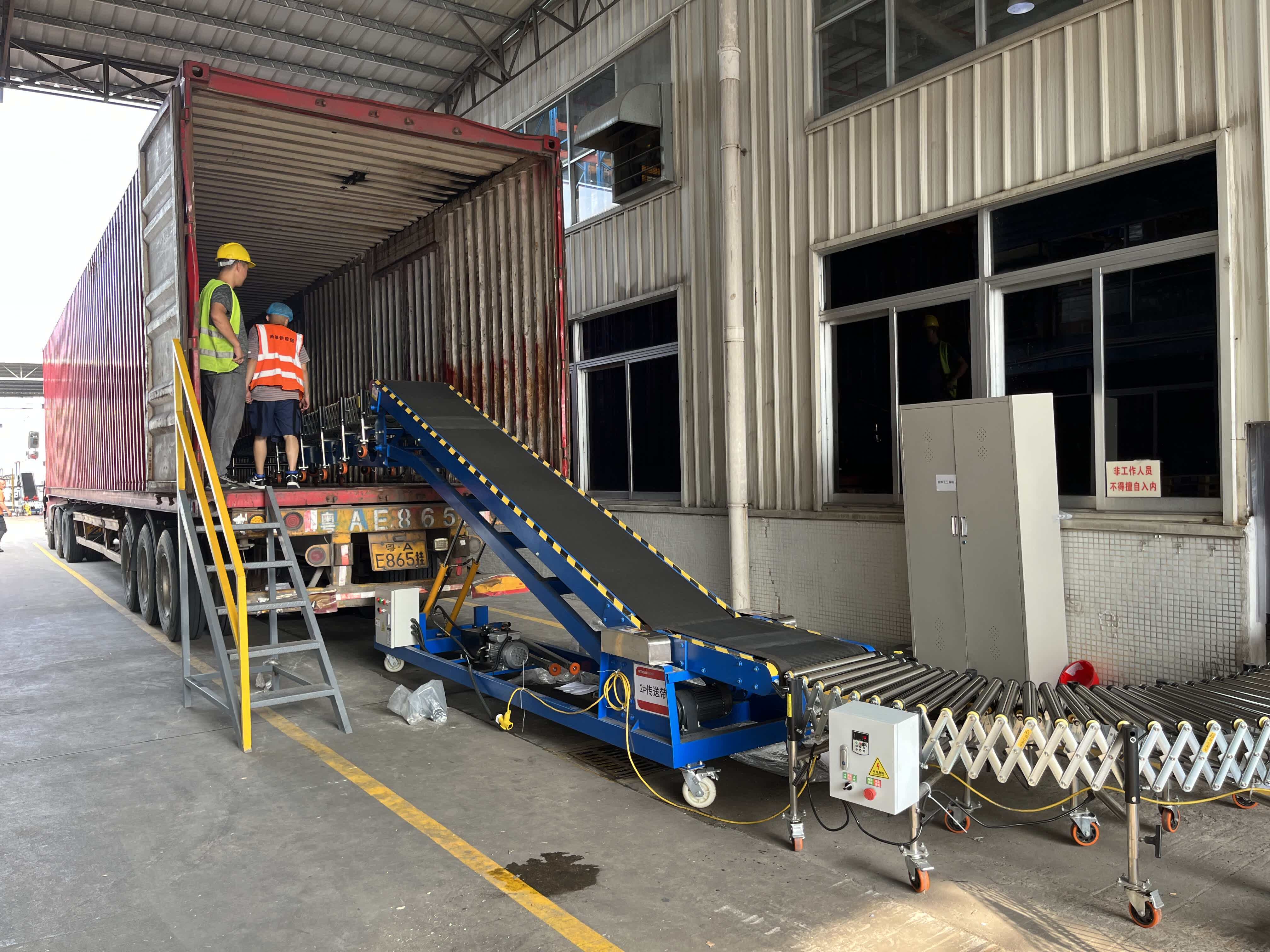 Ramp machine_roller conveyor extending into the compartment application in loading and unloading